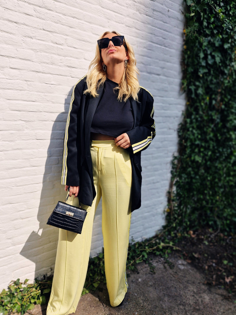 - Kylxo Stripe Pants