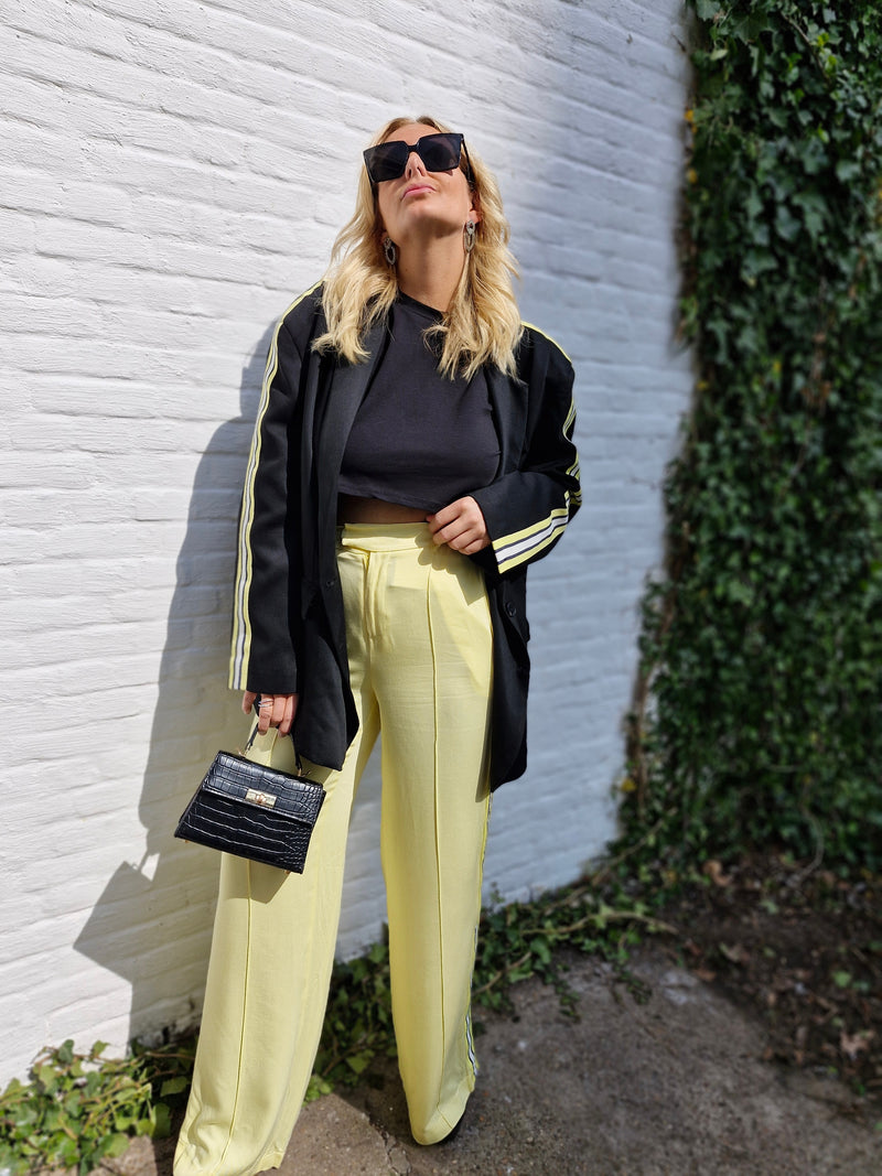 - Kylxo Stripe Pants