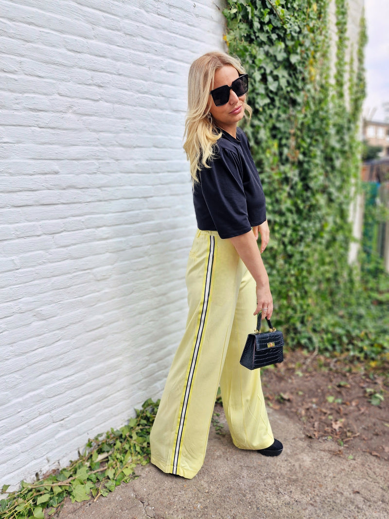 - Kylxo Stripe Pants