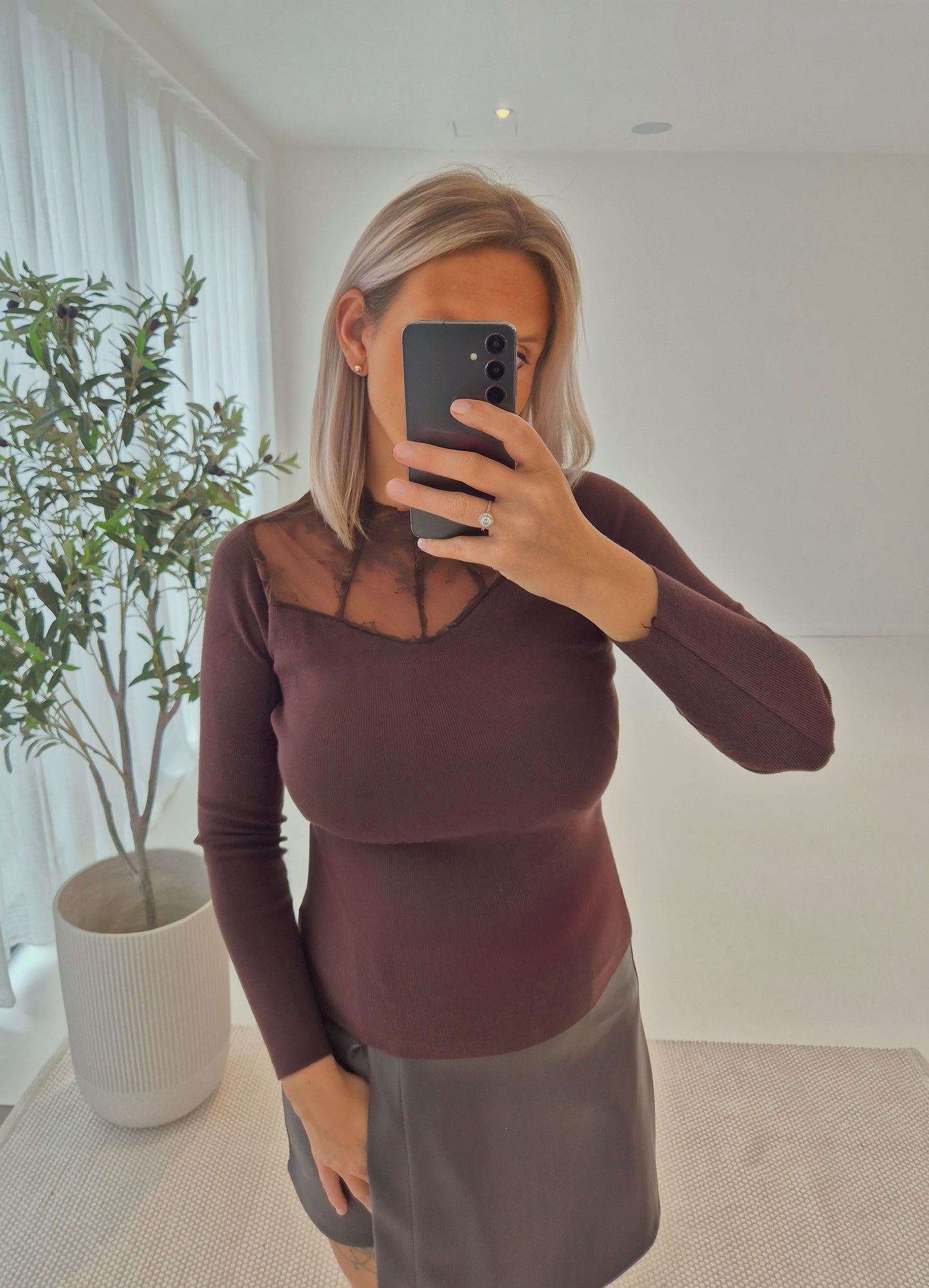- Laura Brown Knit Sweater