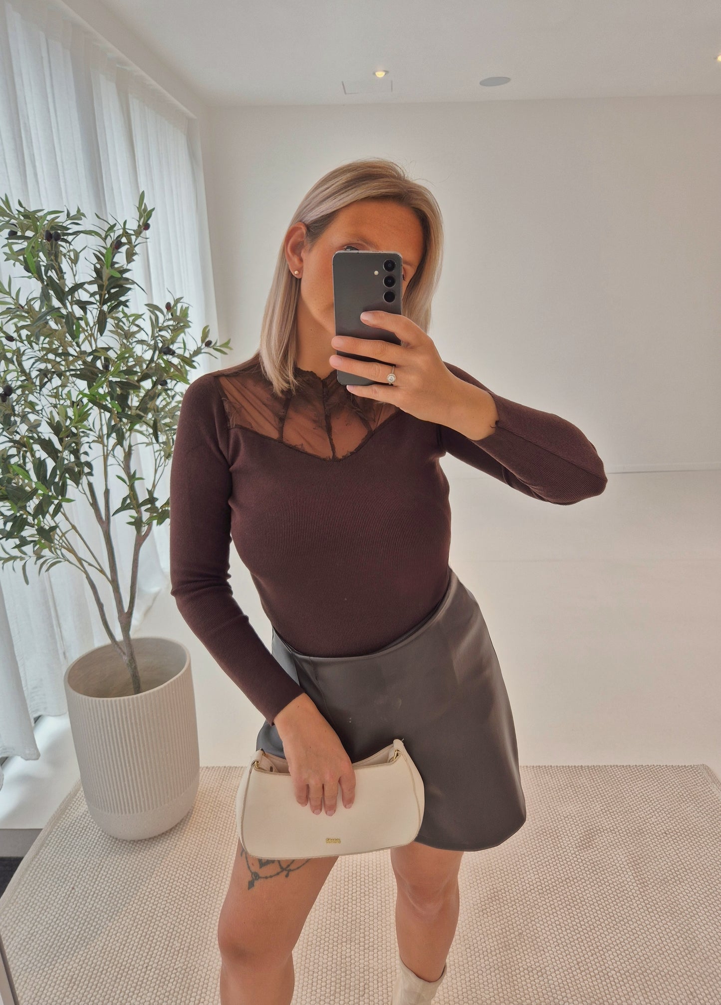 - Laura Brown Knit Sweater
