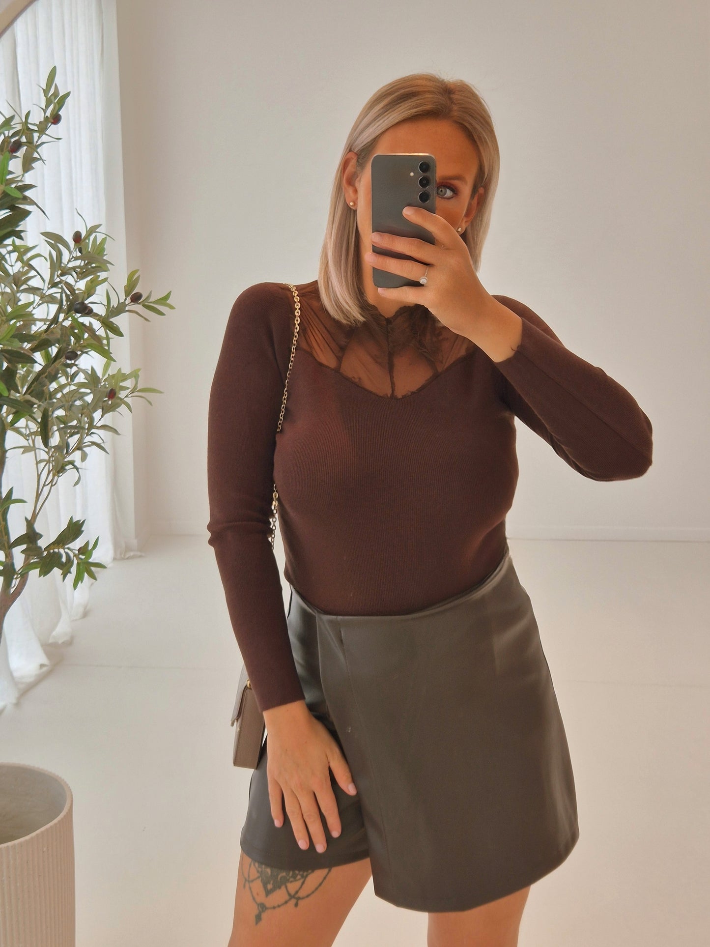 - Laura Brown Knit Sweater