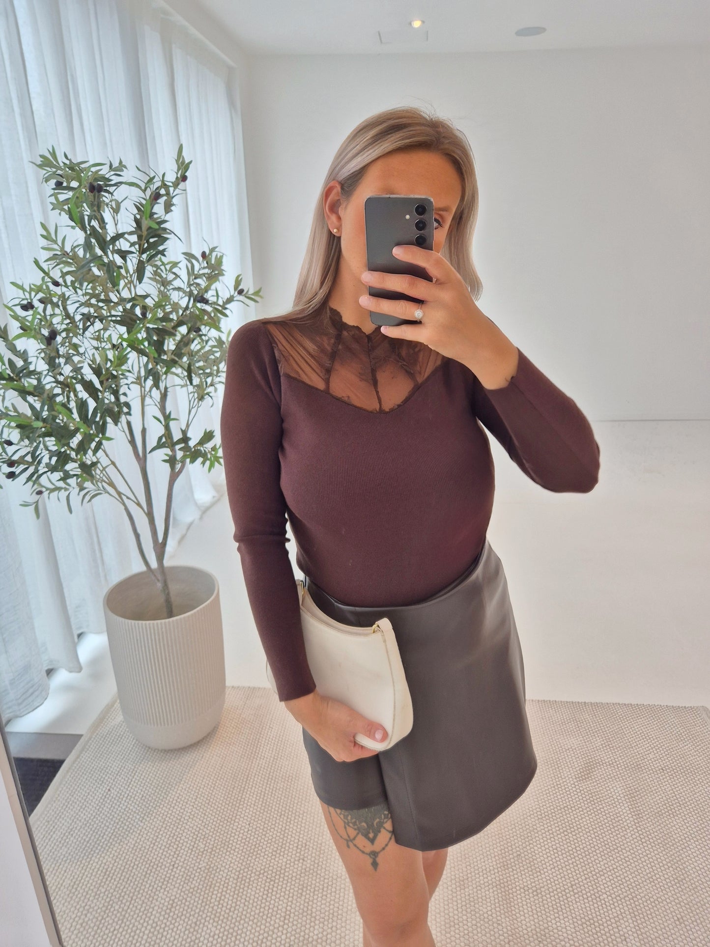 - Laura Brown Knit Sweater