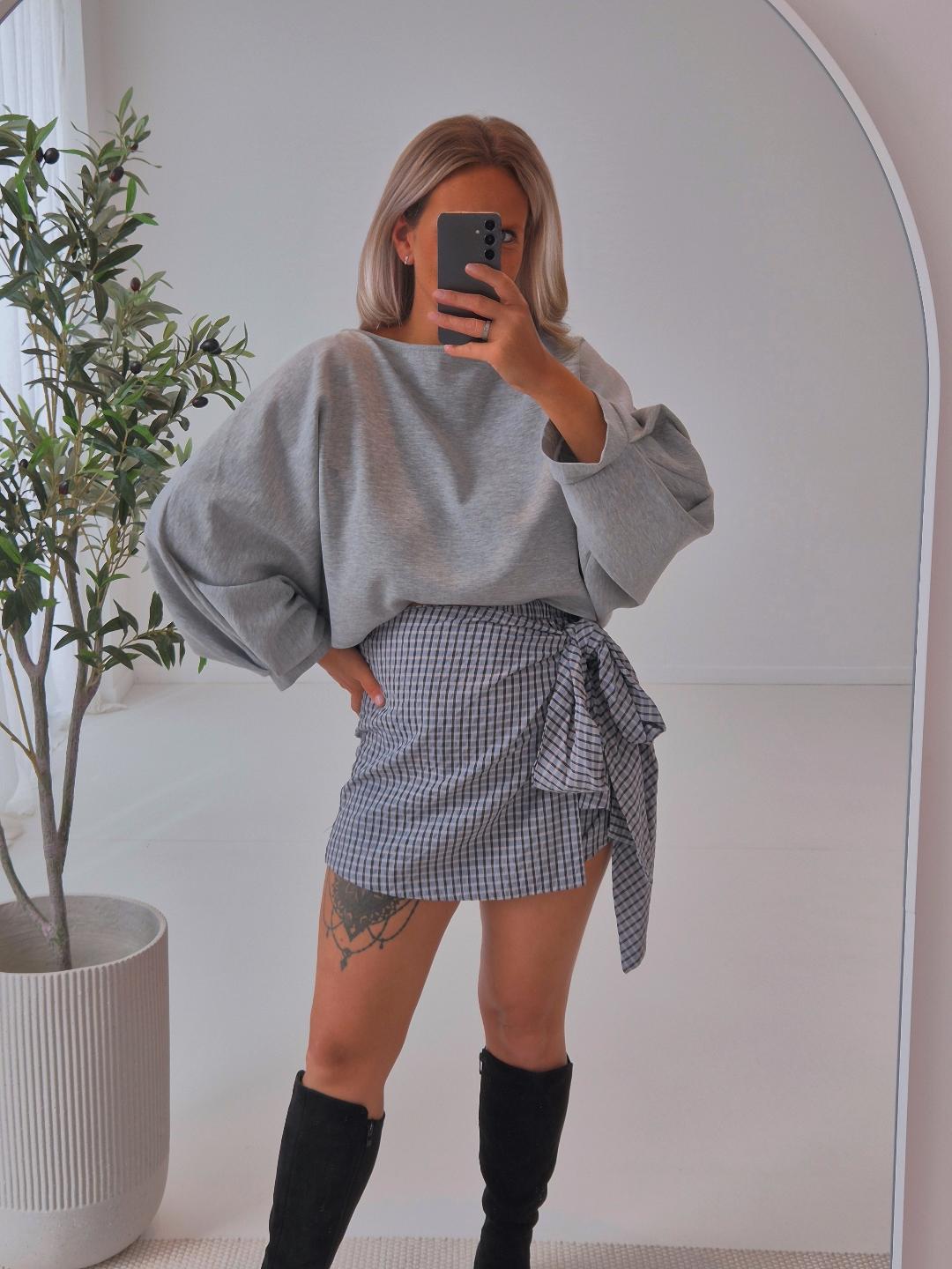 - Noir Wrap Skirt