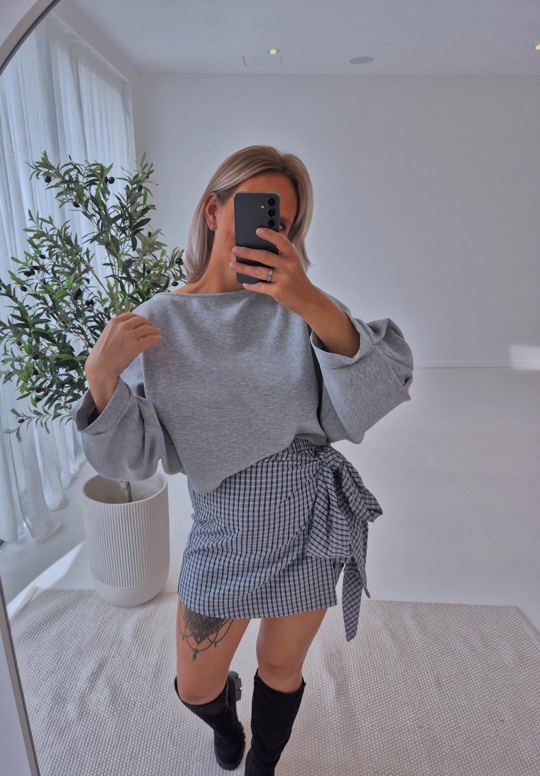 - Noir Wrap Skirt