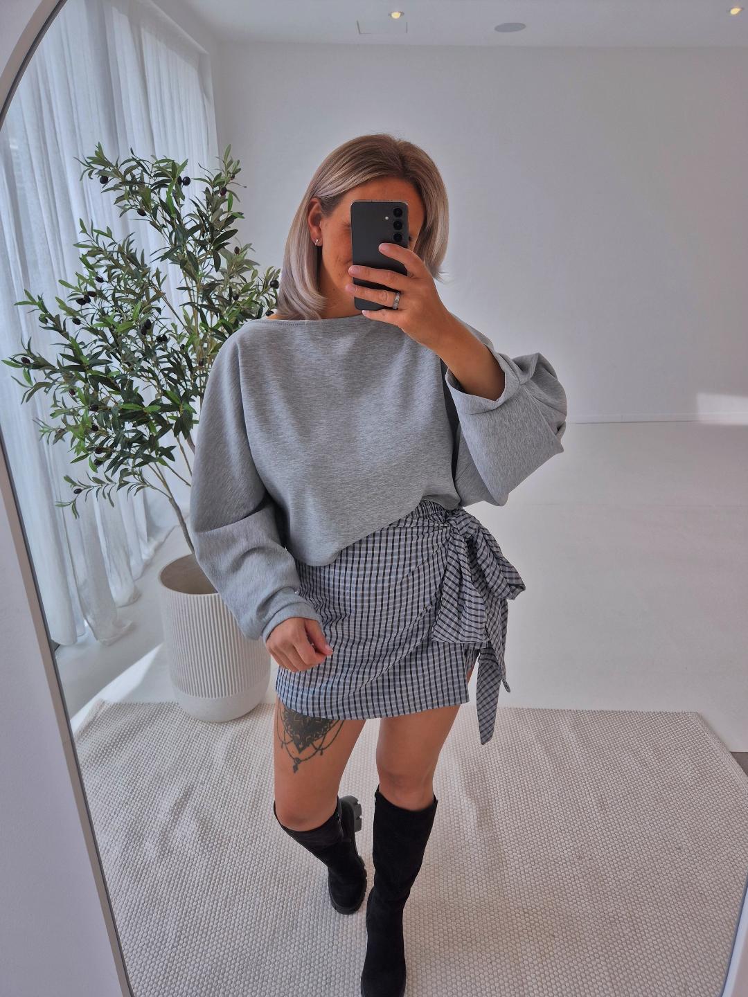 - Noir Wrap Skirt