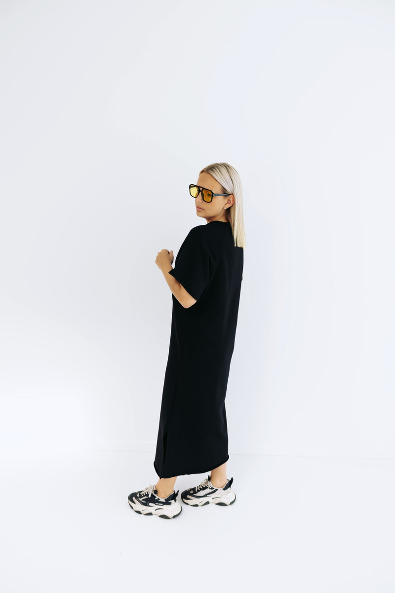 - Black Whisper Dress