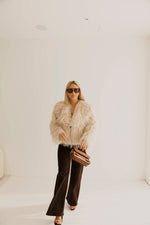 - Douce Fourrure Fur Coat